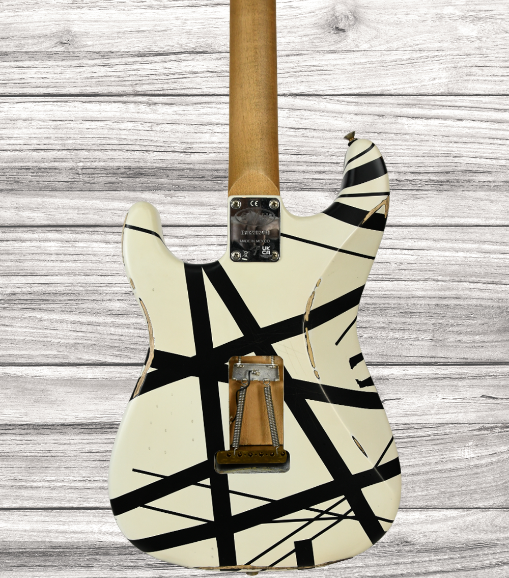 evh-striped-series-78-eruption-maple-fingerboard-white-with-black-stripes-relic_64a69cc45b352.png