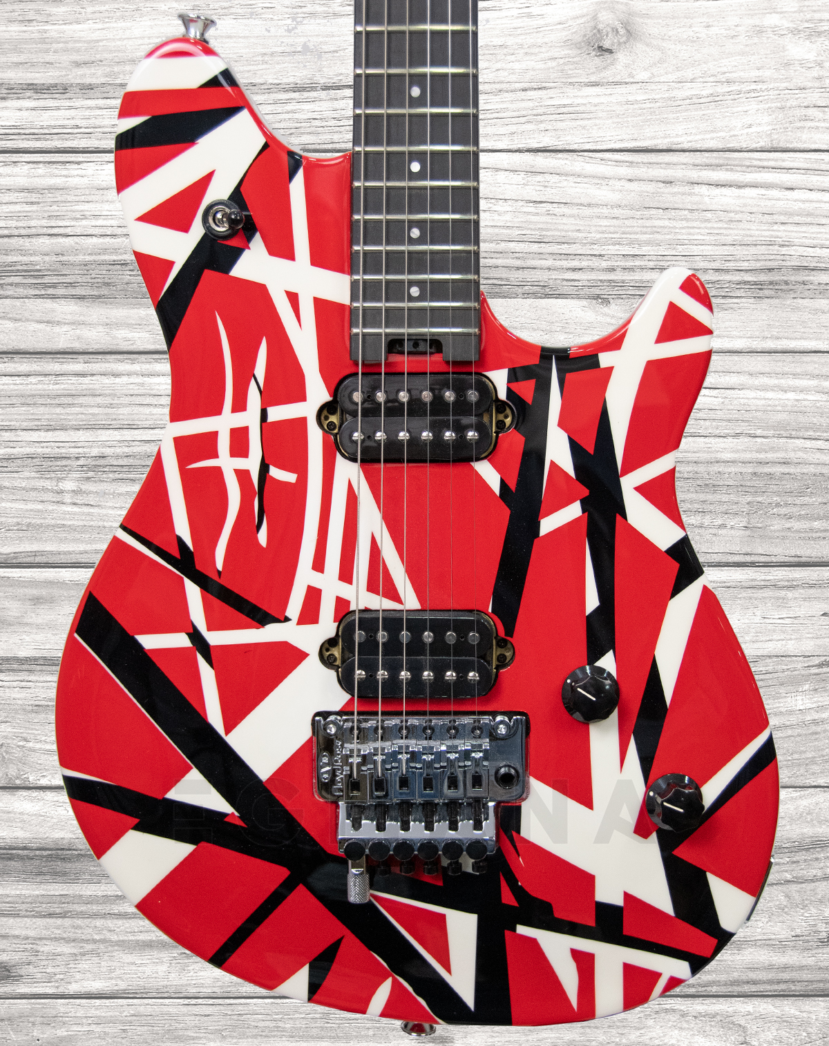 evh-wolfgang-special-striped-ebony-red-black-white-stripes_5f5b5322daf2c.jpg