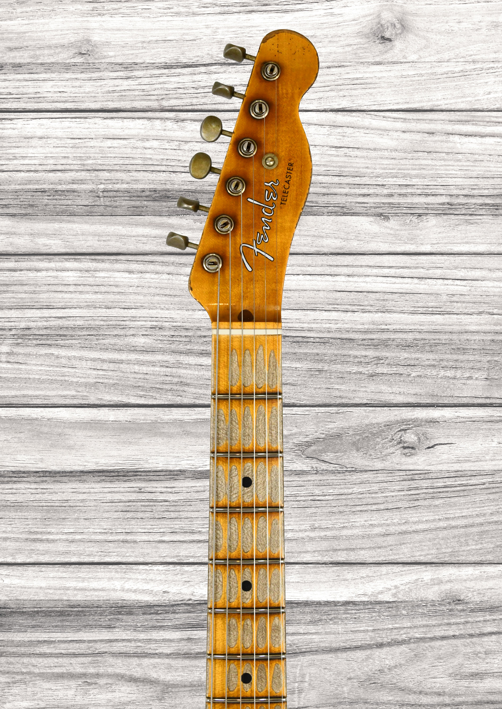 fender-custom-shop-1952-telecaster-super-heavy-relic-faded-violin-burst_6a3d57328a647.jpg