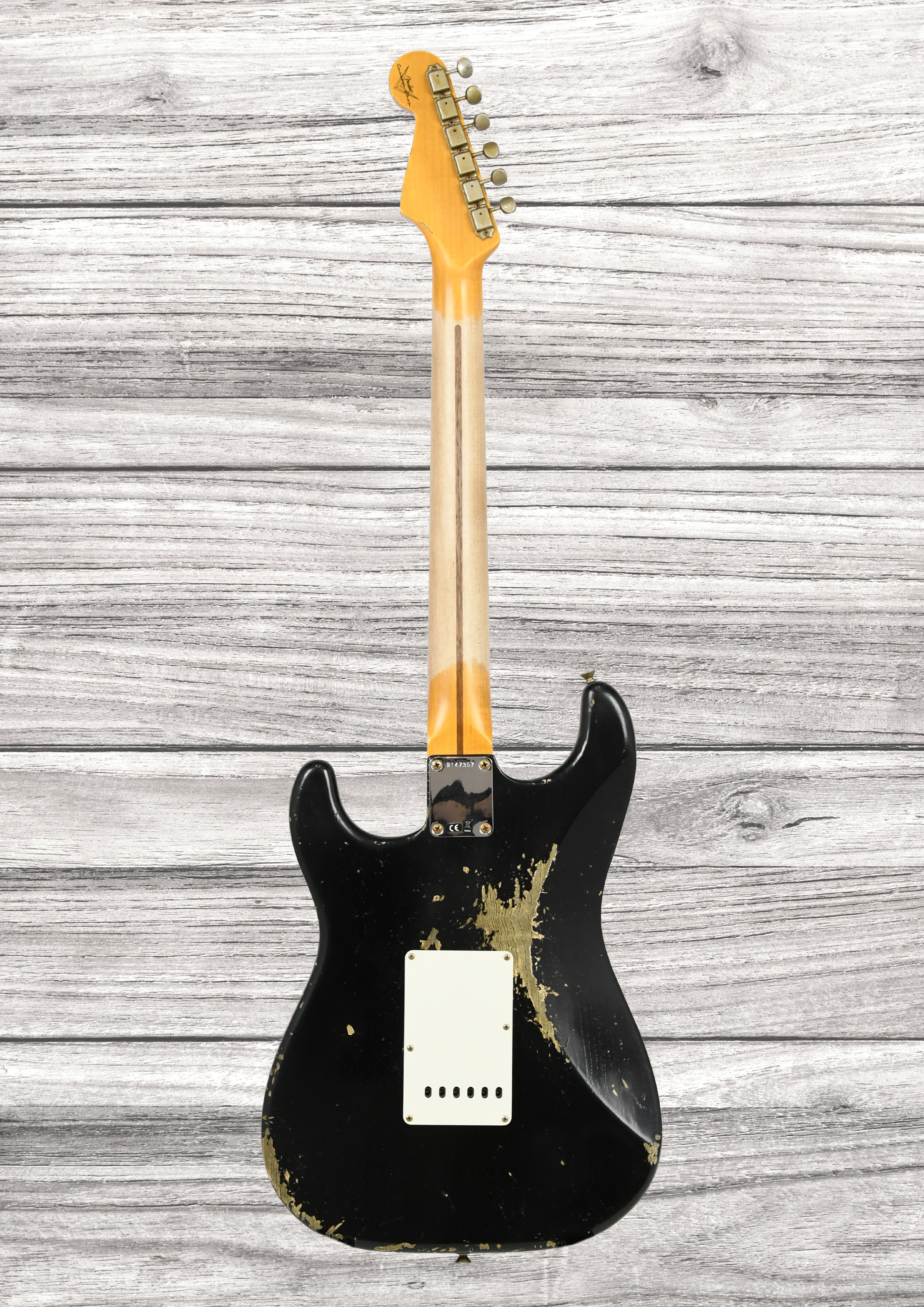 fender-custom-shop-1957-stratocaster-heavy-relic-1-piece-quartersawn-mn-black_6a5a4338387f6.jpg