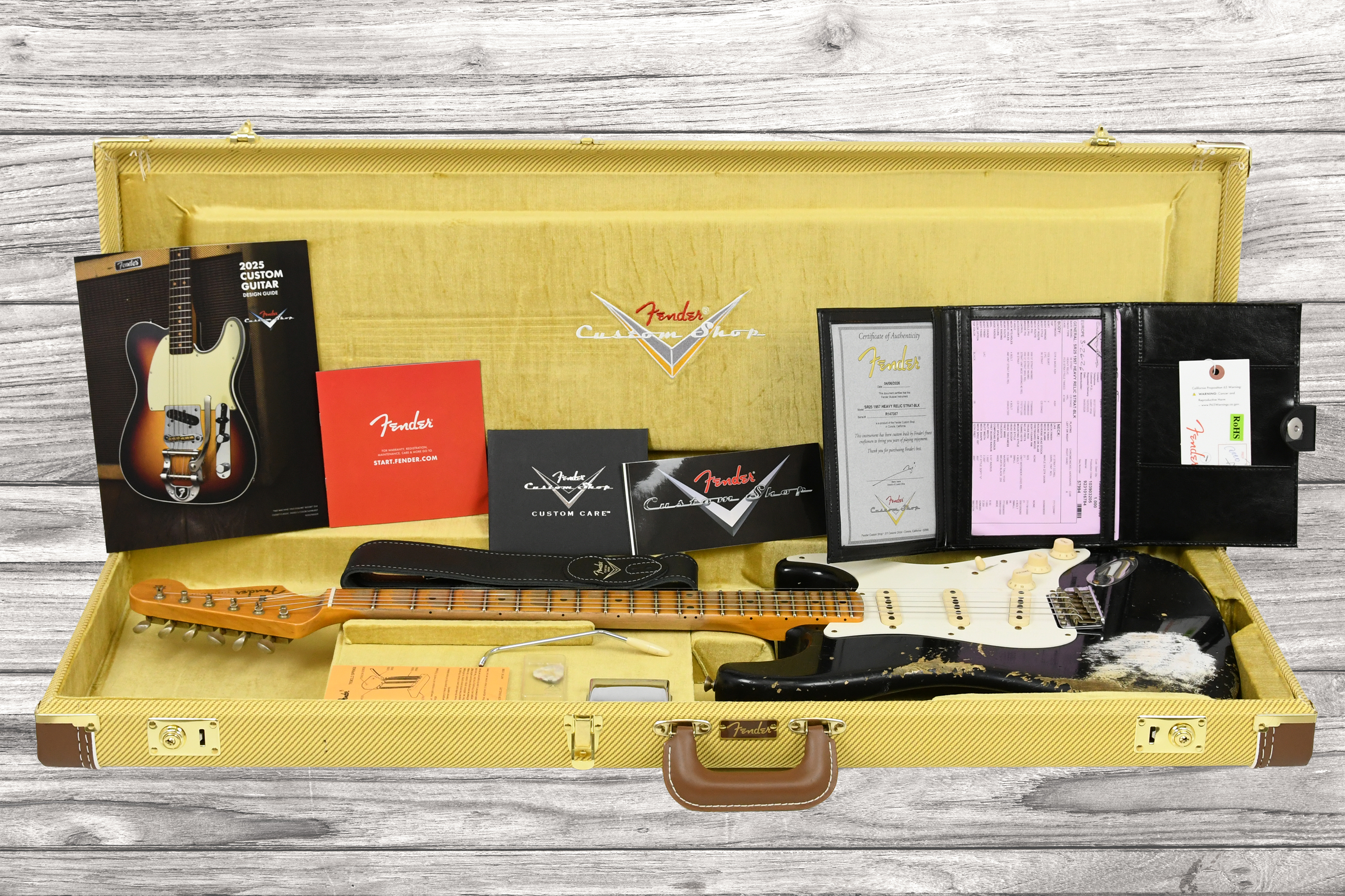 fender-custom-shop-1957-stratocaster-heavy-relic-1-piece-quartersawn-mn-black_6a5a433d840ab.jpg