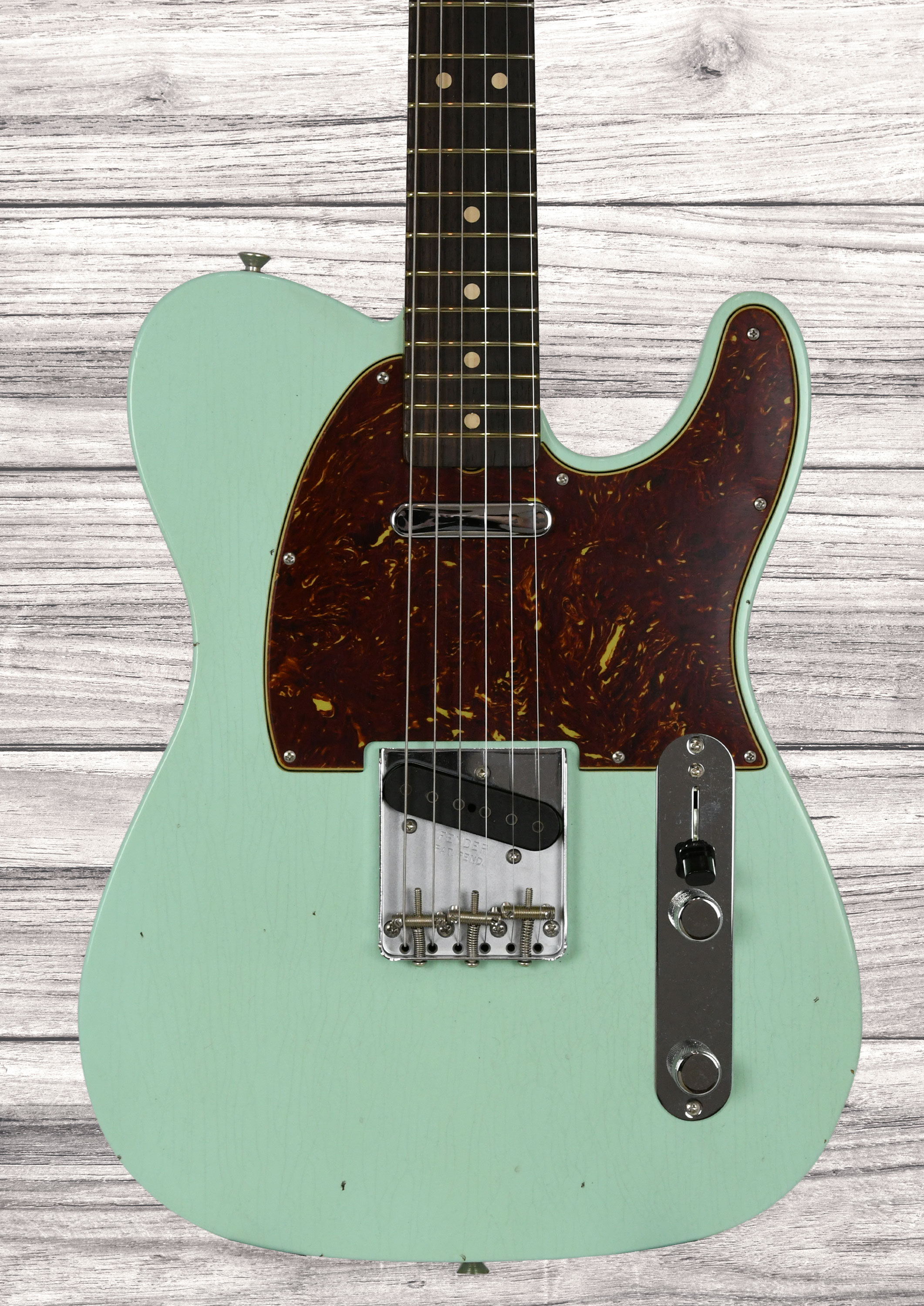 fender-custom-shop-1963-telecaster-journeyman-relic-aged-surf-green_6a3d2f6467459.jpg