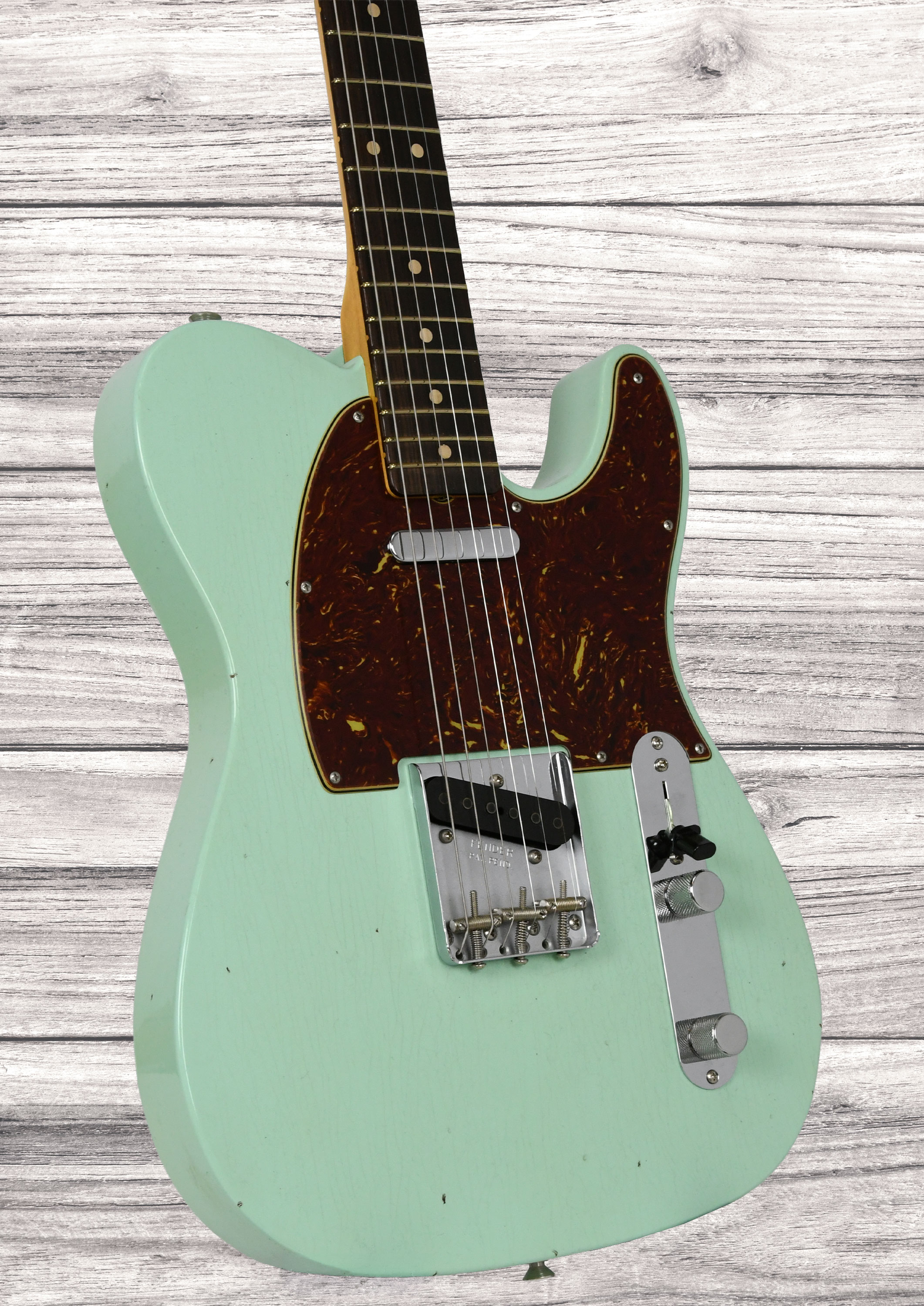 fender-custom-shop-1963-telecaster-journeyman-relic-aged-surf-green_6a3d2f670445e.jpg
