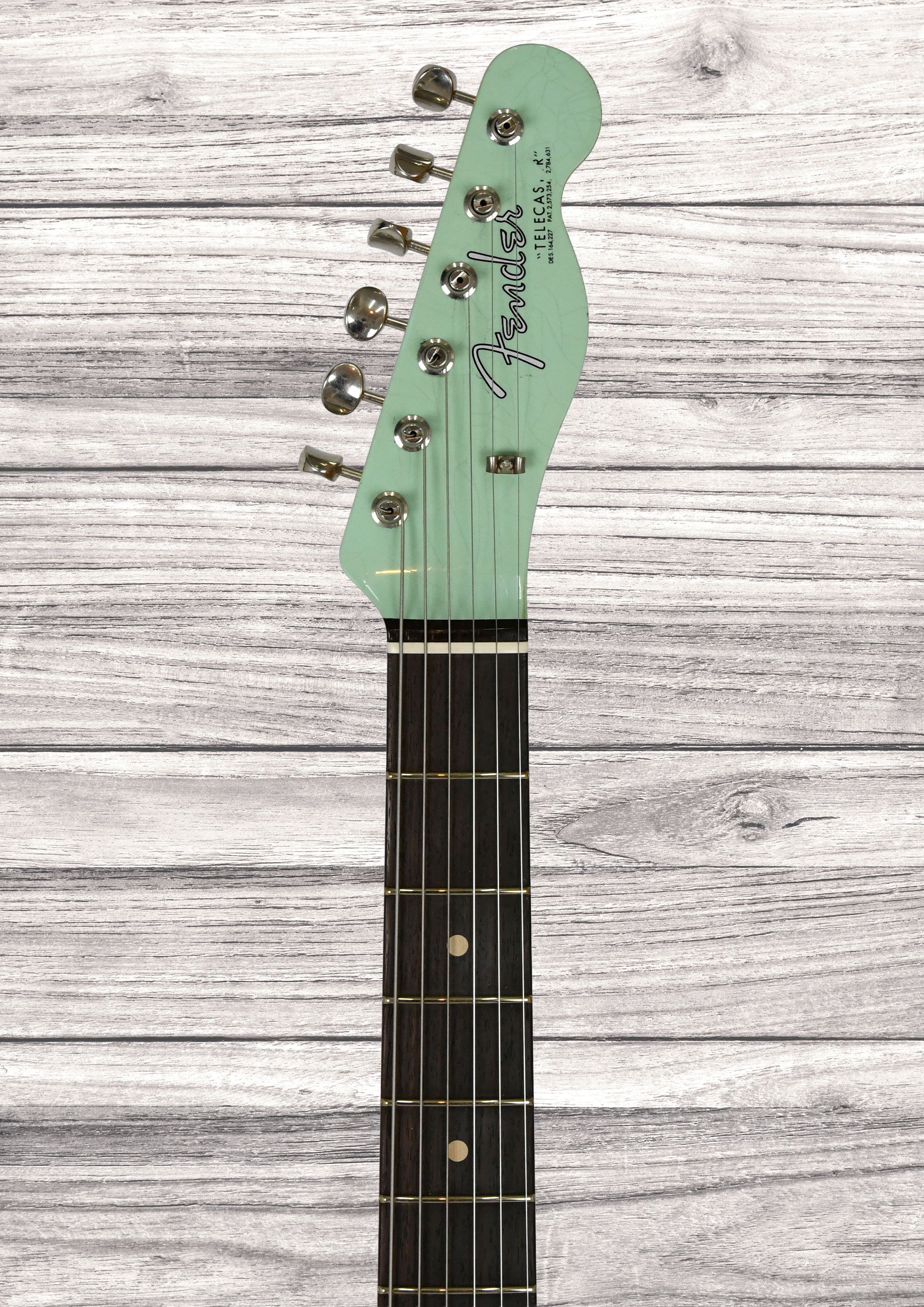 fender-custom-shop-1963-telecaster-journeyman-relic-aged-surf-green_6a3d2f6c0e907.jpg