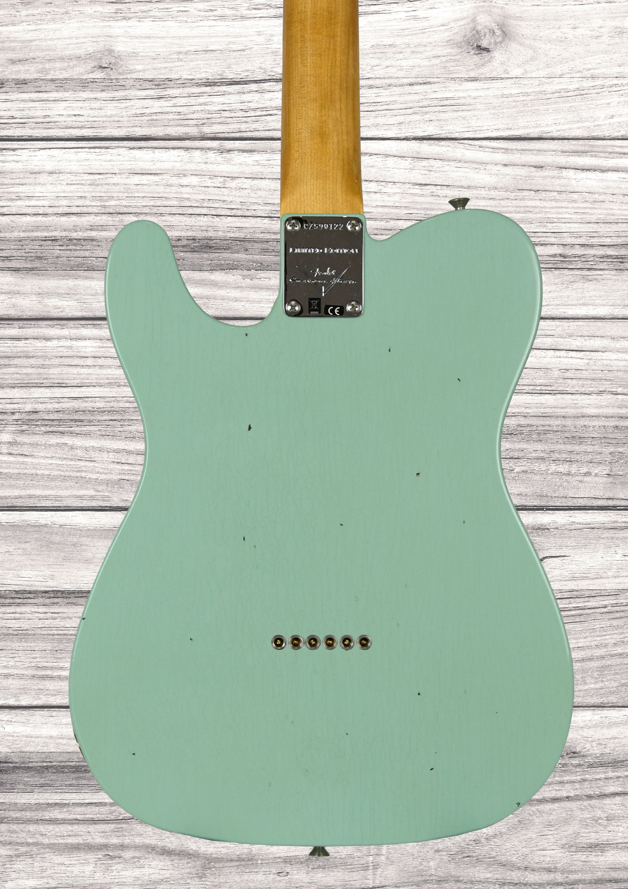 fender-custom-shop-1963-telecaster-journeyman-relic-aged-surf-green_6a3d2f712b51c.jpg