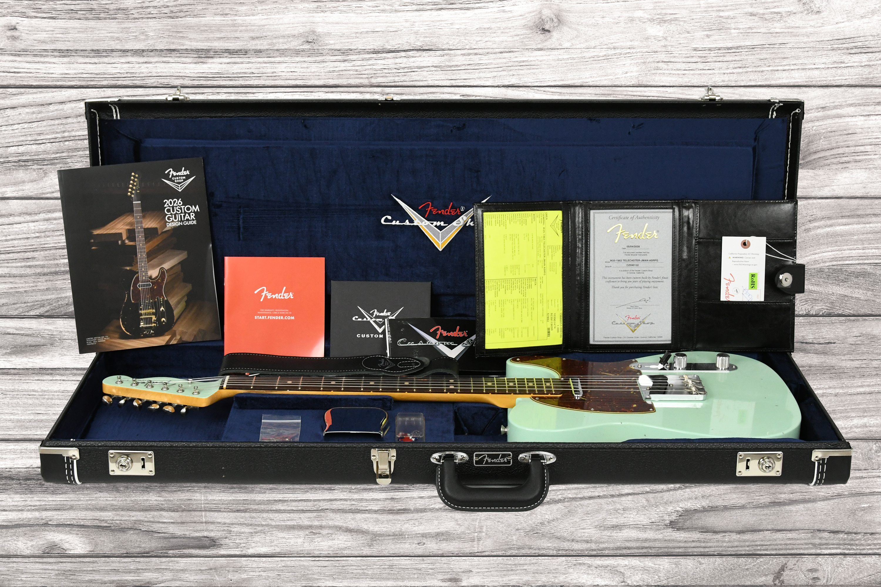 fender-custom-shop-1963-telecaster-journeyman-relic-aged-surf-green_6a3d2f76350af.jpg