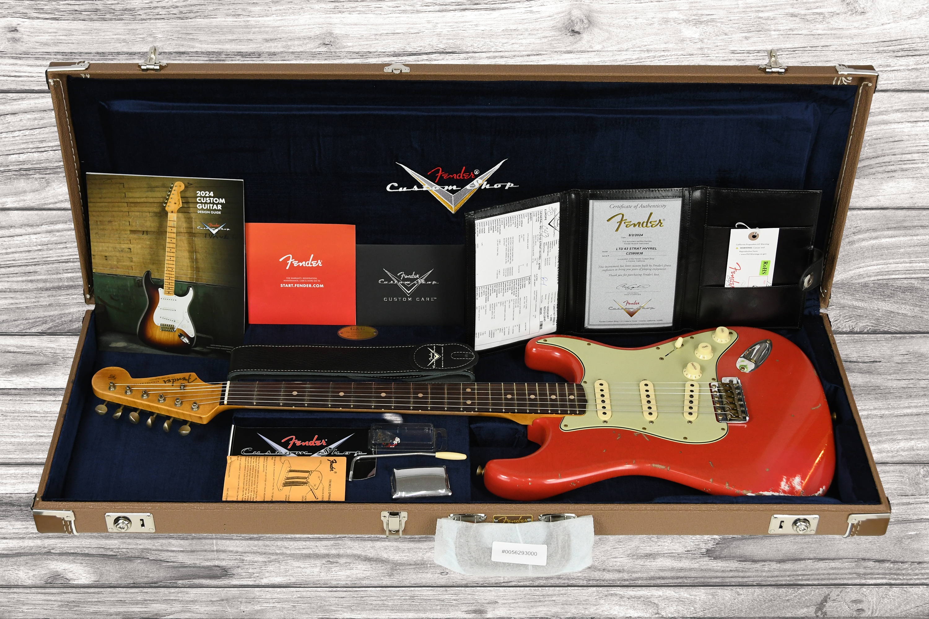 fender-custom-shop-63-stratocaster-heavy-relic-aged-fiesta-red_68fa41397485e.jpg