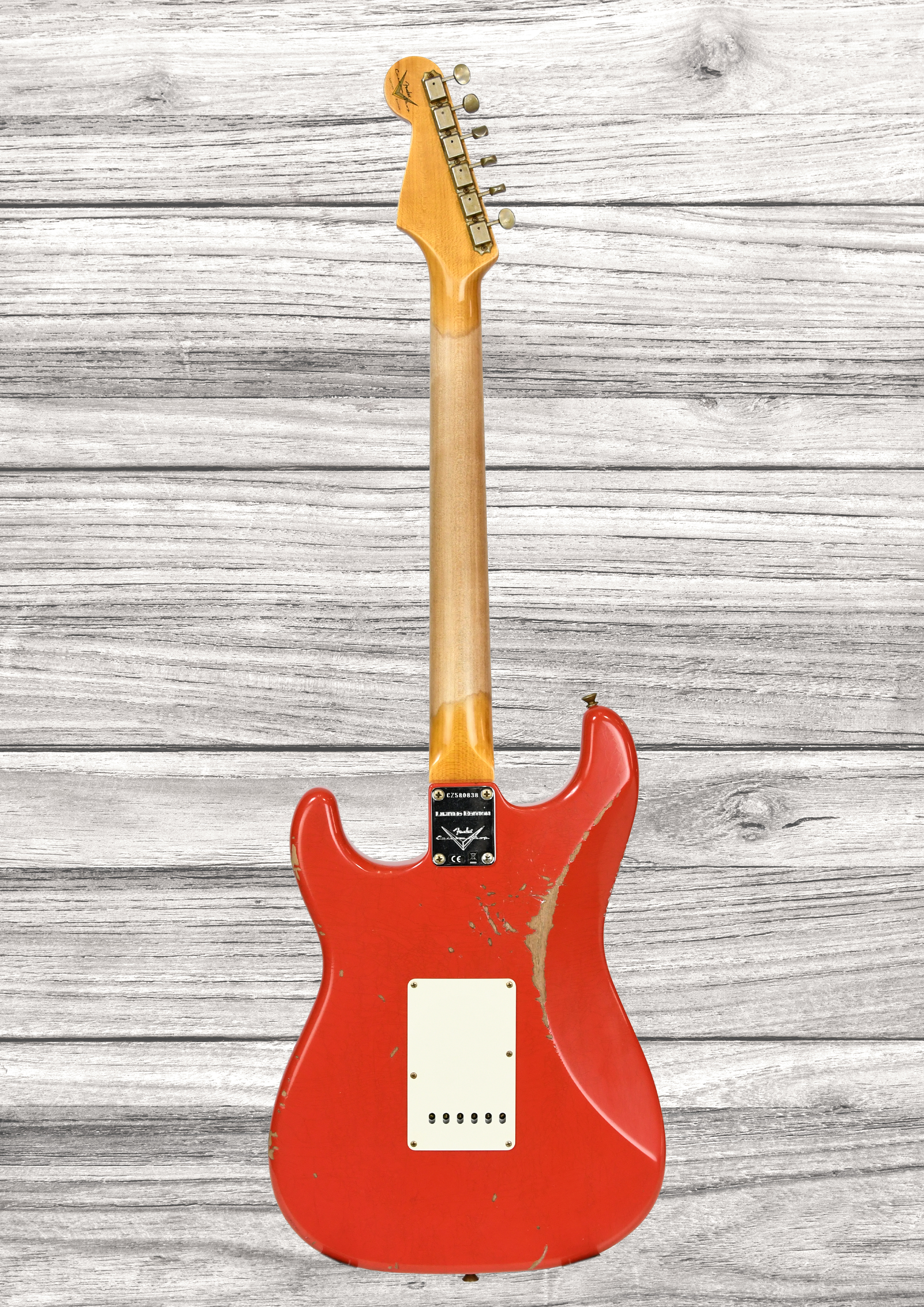 fender-custom-shop-63-stratocaster-heavy-relic-aged-fiesta-red_68fa413c48c9a.jpg