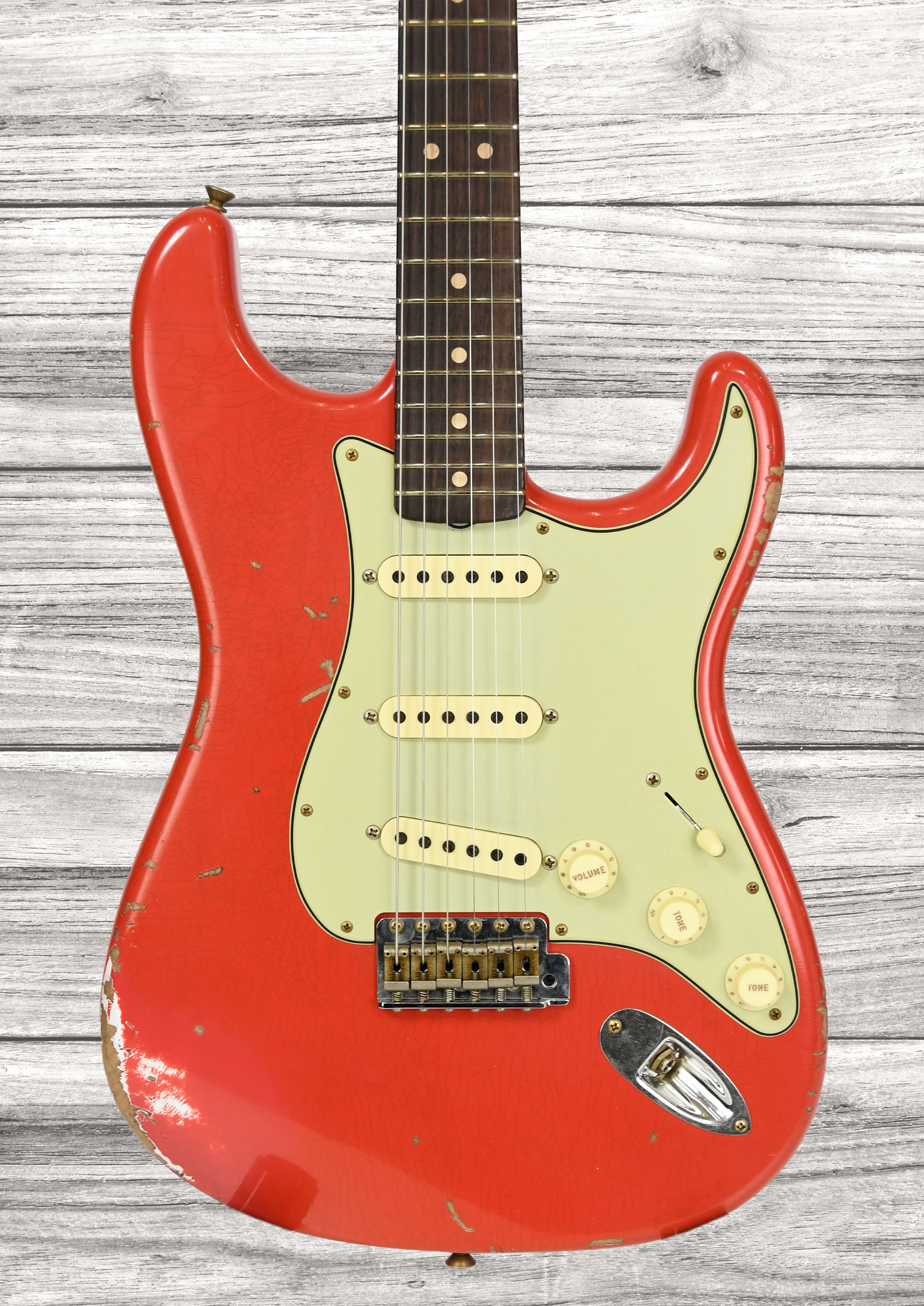 fender-custom-shop-63-stratocaster-heavy-relic-aged-fiesta-red_68fa414ddbe88.jpg
