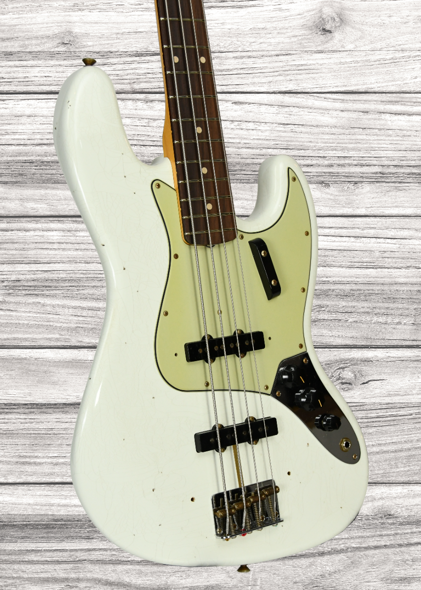 fender-custom-shop-64-jazz-bass-journeyman-relic-olympic-white-rw_65bbd6c6bdbaa.png