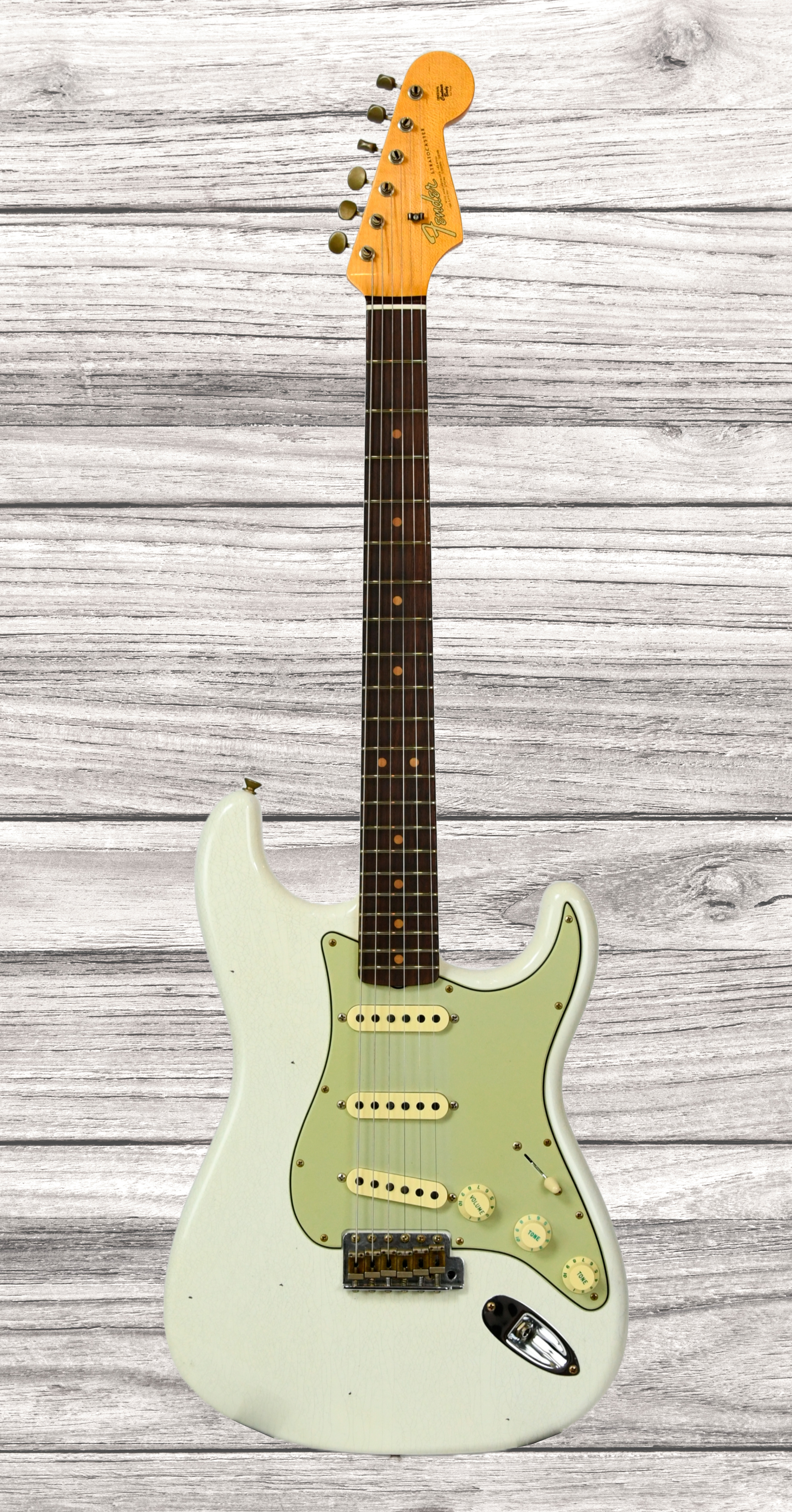 fender-custom-shop-64-stratocasterjourneyman-relic-aged-olympic-white_66e30ca60fd6e.jpg