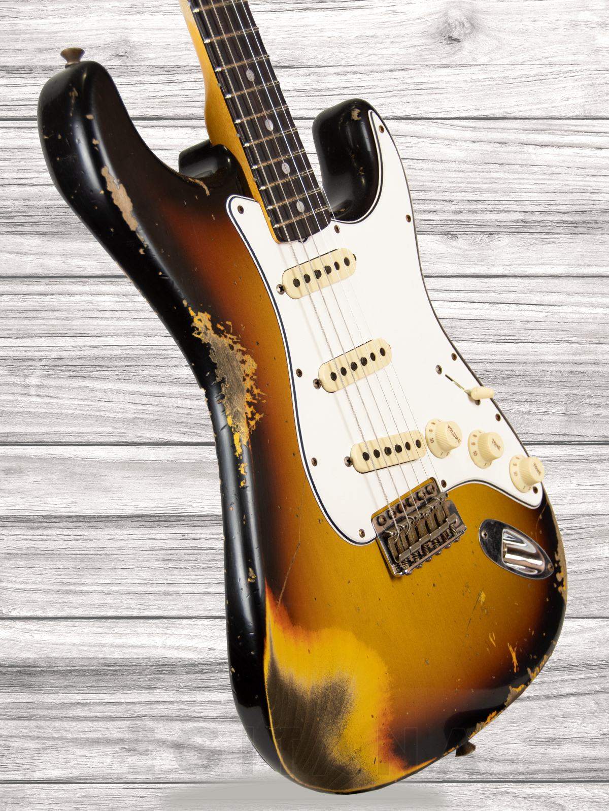 fender-custom-shop-67-stratocaster-heavy-relic-faded-aged-3-colour-sunburst_609d546d589d5.jpg