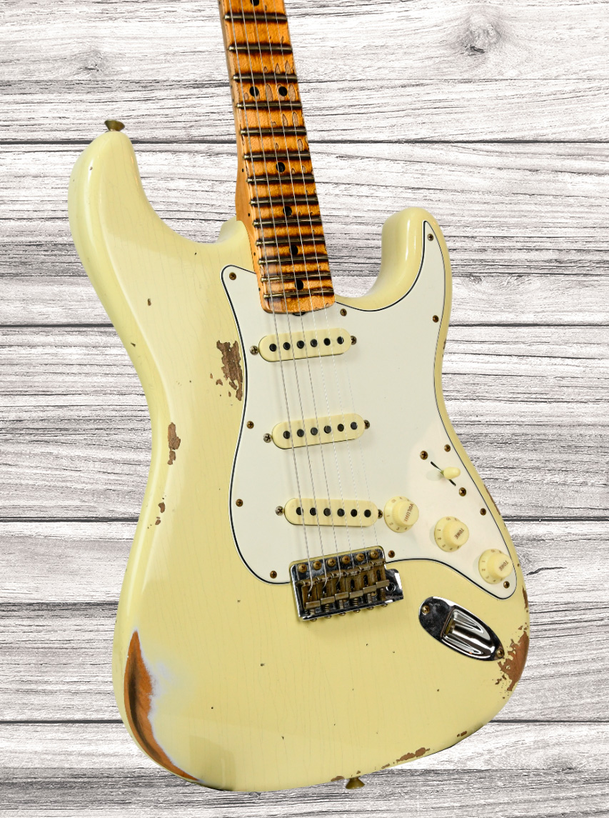 fender-custom-shop-69-stratocaster-heavy-relic-aged-vintage-white_6704033edf99e.jpg