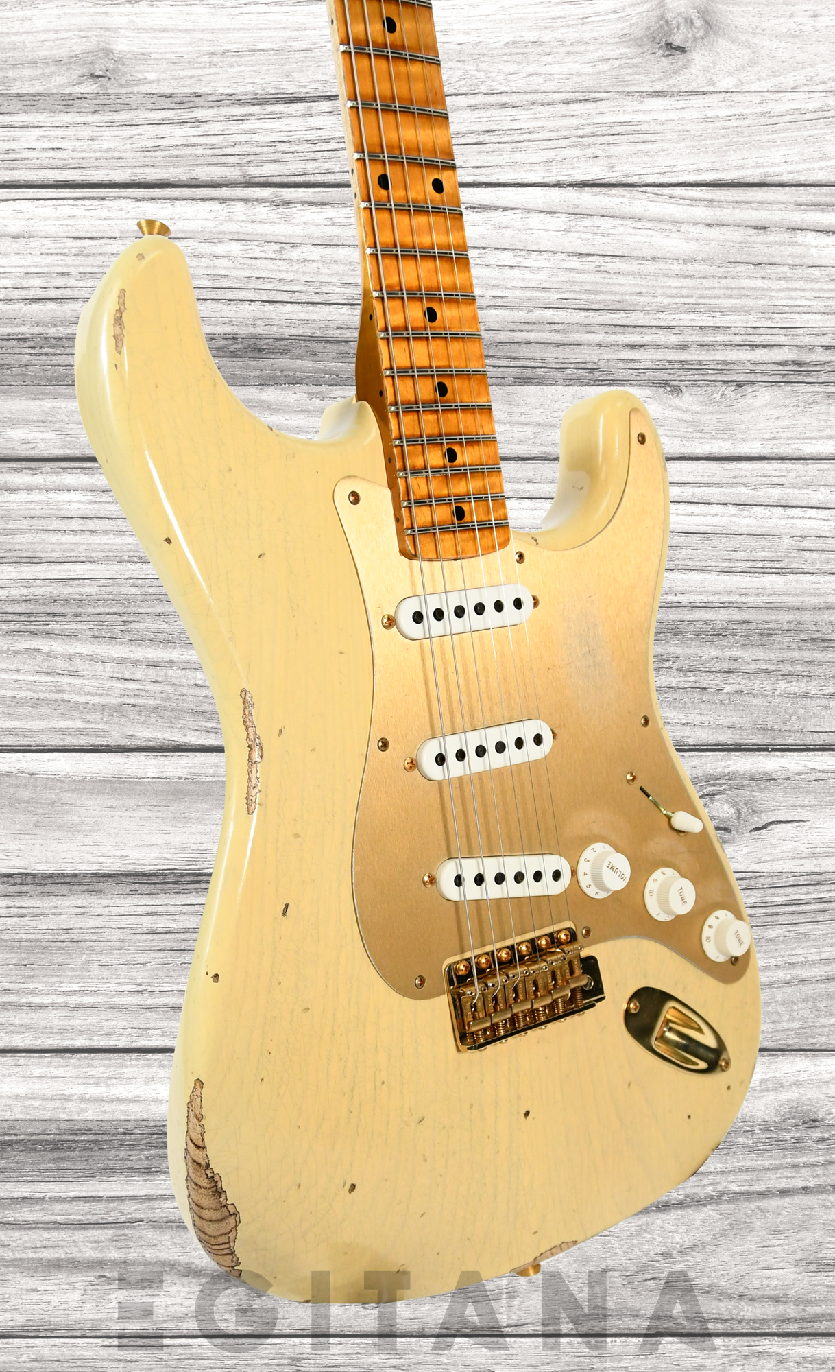 fender-custom-shop-limited-edition-55-bone-tone-relic-2a-flame-maple-fingerboard-aged-honey-blonde-gold-hardware_63c591674b7c8.jpg