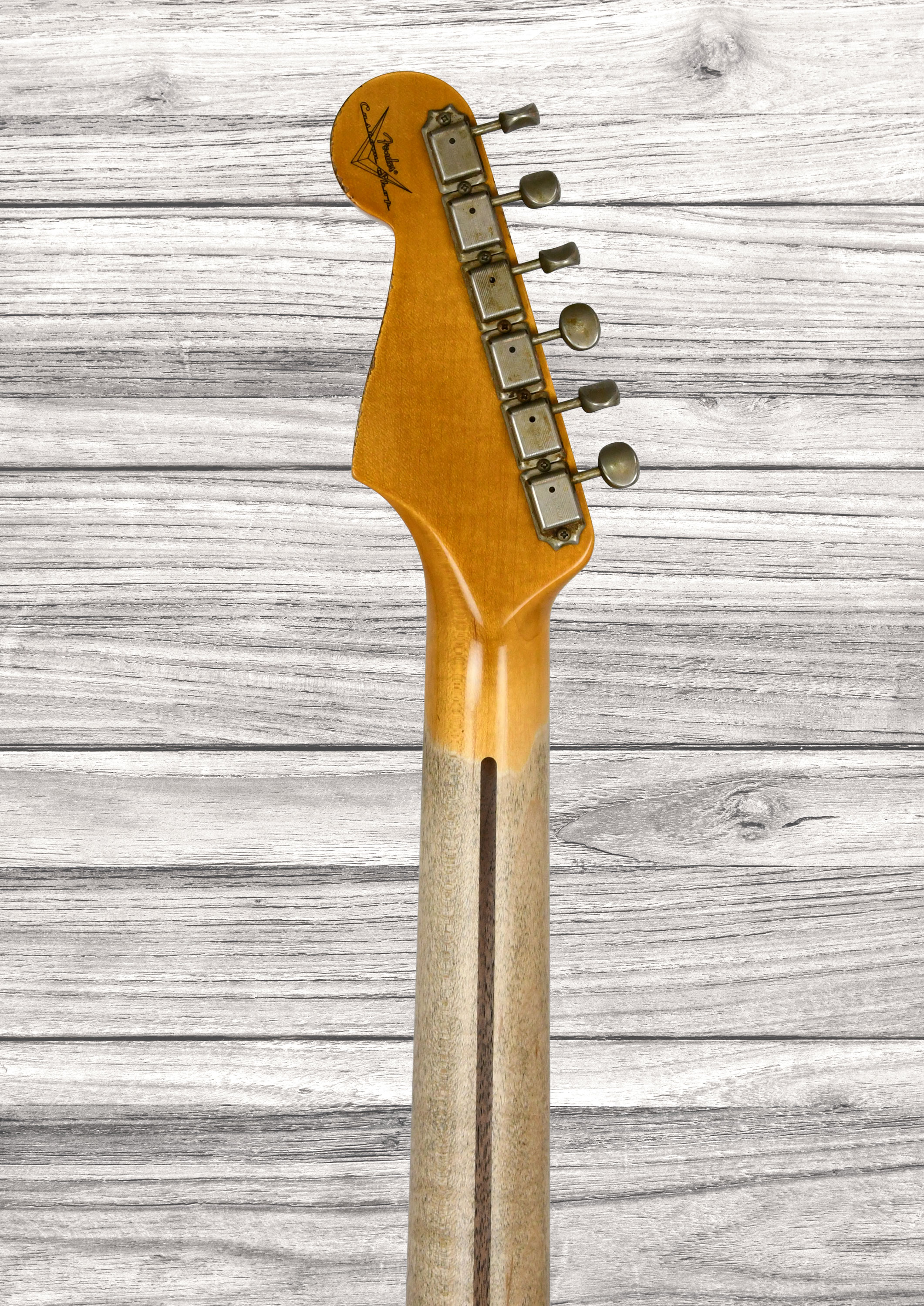 fender-custom-shop-stratocaster-1957-heavy-relic-aged-2-color-sunburst_6a3d4ee056d6b.jpg