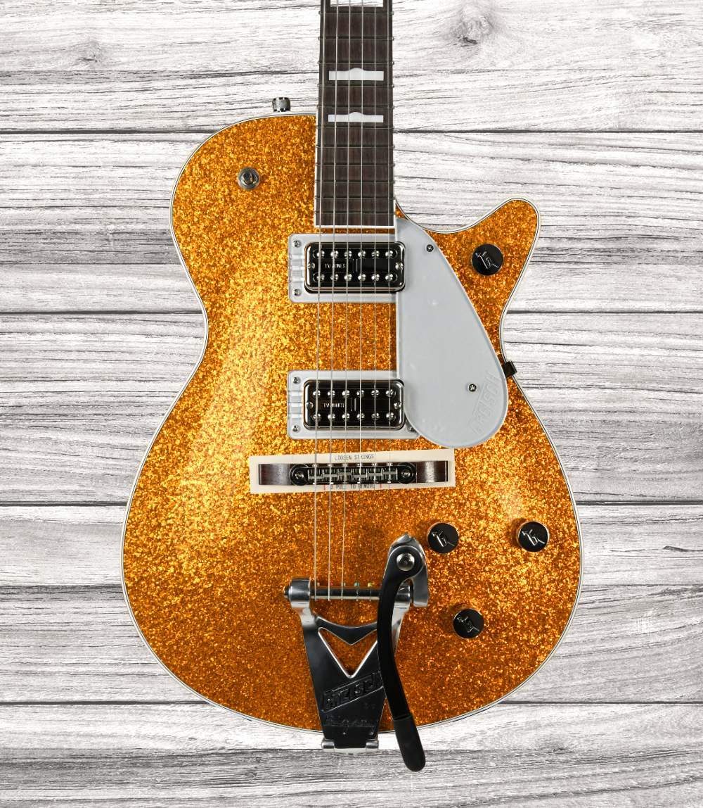 gretsch-g6129t-89-vintage-select-89-sparkle-jet-bigsby-rosewood-fingerboard-gold-sparkle_64b55b79cd983.jpg