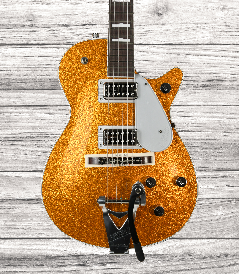 gretsch-g6129t-89-vintage-select-89-sparkle-jet-bigsby-rosewood-fingerboard-gold-sparkle_64b55b79cd983.png