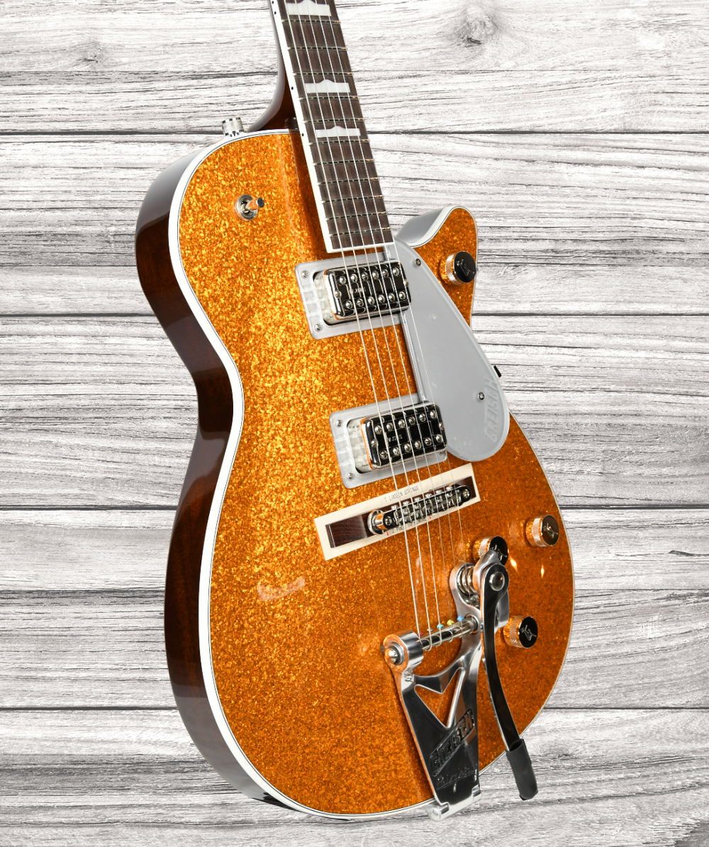 gretsch-g6129t-89-vintage-select-89-sparkle-jet-bigsby-rosewood-fingerboard-gold-sparkle_64b55b7a7a59d.jpg