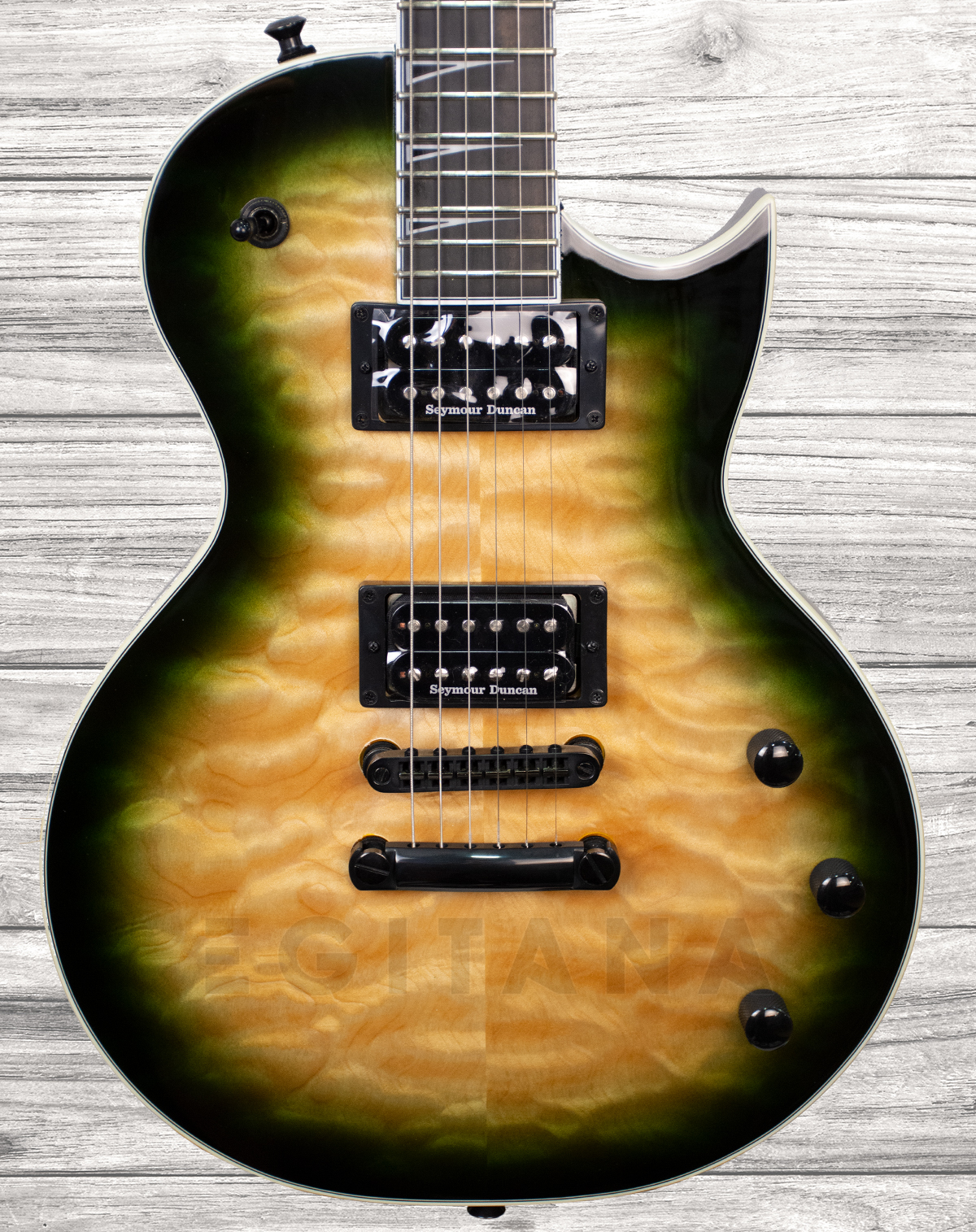 jackson-pro-series-monarkh-scq-ebony-alien-burst_5f15abe10cb65.jpg