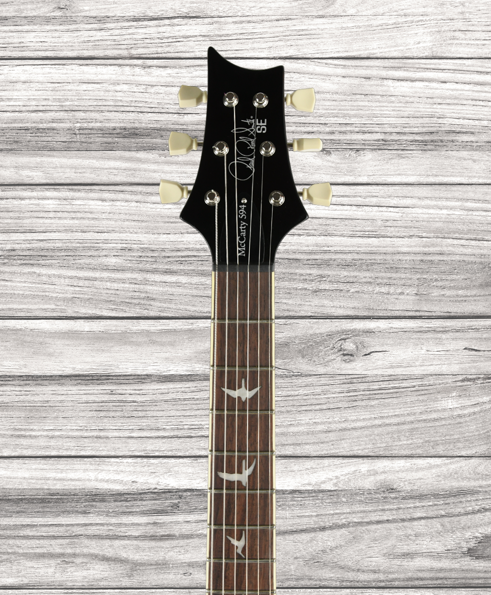 prs-se-mccarty-594-singlecut-bg_64b546d2253fc.png